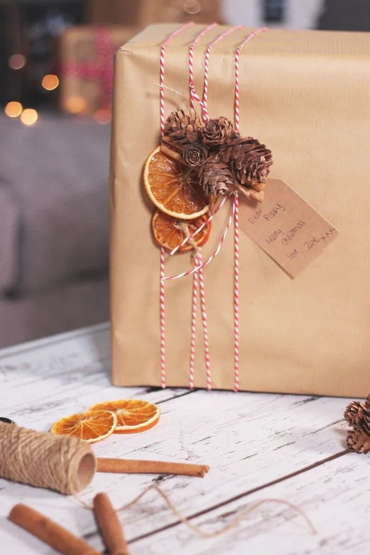 christmas gift wrapping natural materials brown paper orange slices