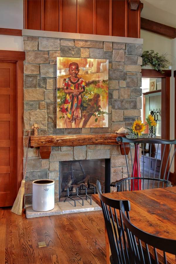 reclaimed fireplace mantel stone surround dining room