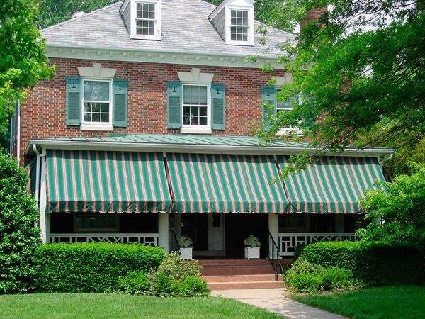 front brick facade striped awnings
