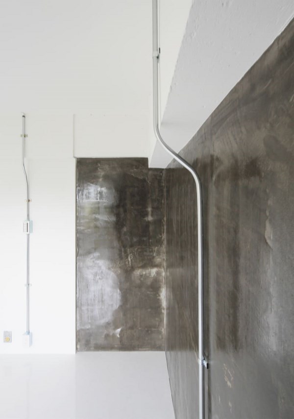jun murata leaden wall in white space renovation minimalist interiors