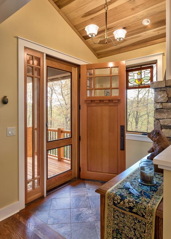 wood-screen-doors-house-entry-tile-flooring-wood-ceiling