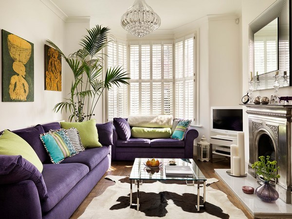 living room design fireplace purple sofa 