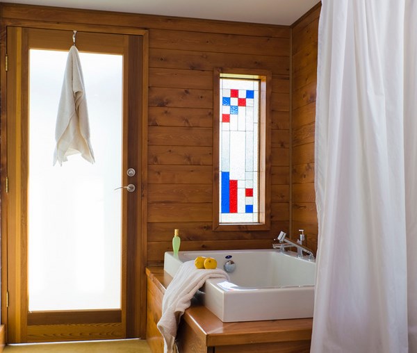 contemporary bathroom bath tub wood walls