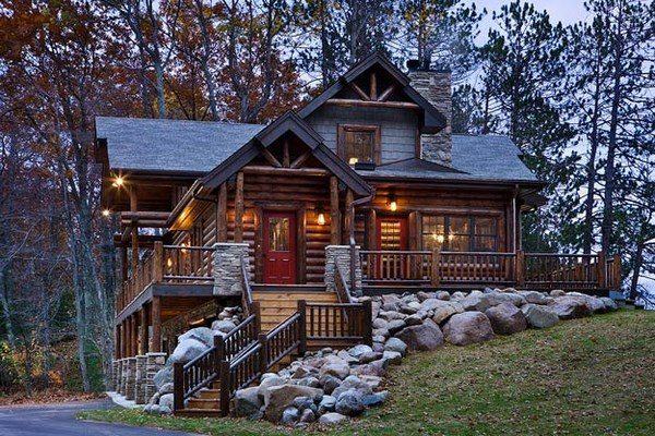 Log cabin homes exterior staircase boulders porch decor