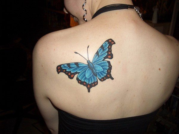 beautiful blue ink butterfly tattoo on shoulder
