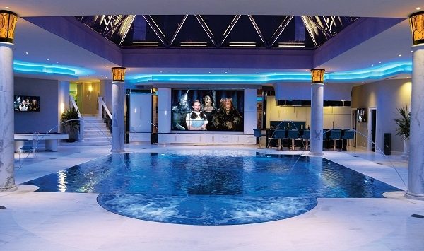 inspiring indoor swimming pools design with TV screen