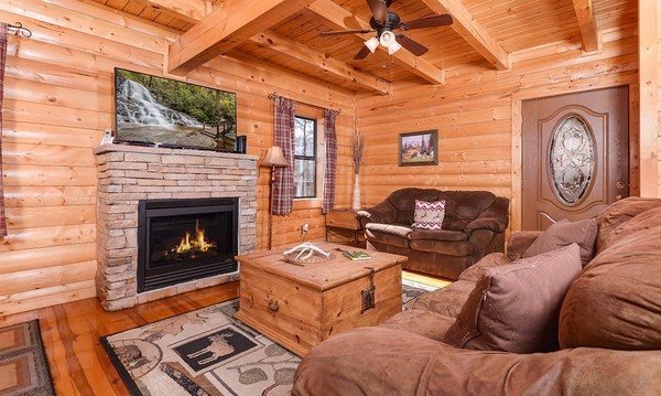 log house interior living room fireplace