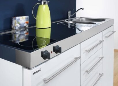 modern-mini-kitchen-design-with-white-cabinets-and-hot-plate