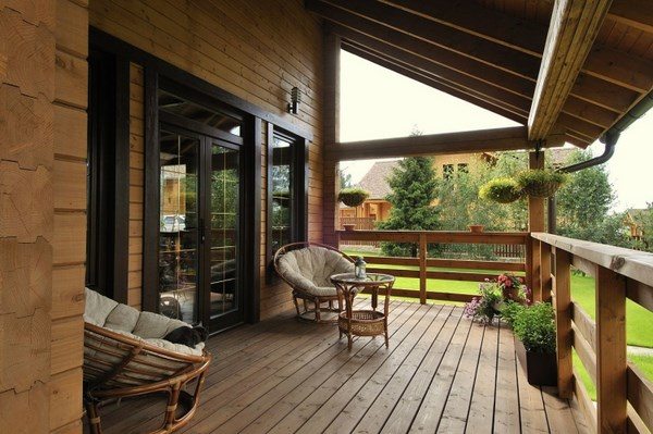veranda design tips and ideas country style wood flooring armchairs