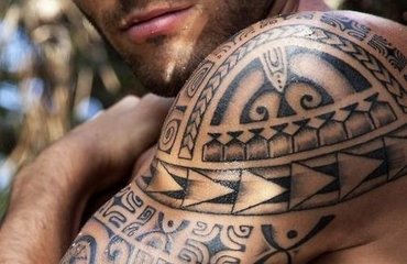 Tattoo-styles-and-techniques-cool-half-sleeve-polynesian-tattoo