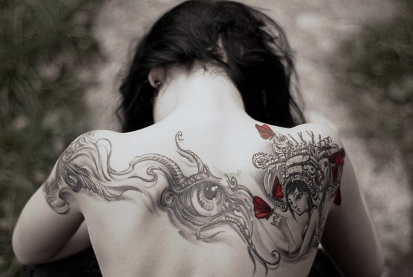 back tattoo for women styles surrealism