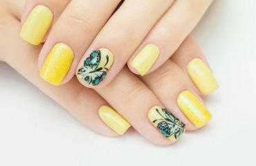 bright-yellow-nail-polish-butterfly-nail-art