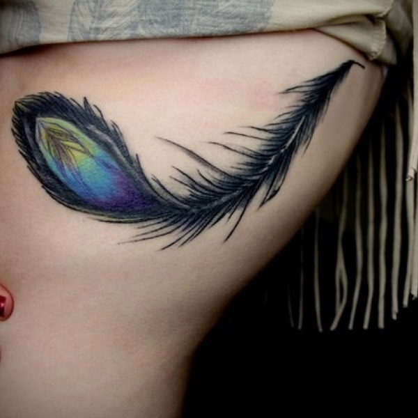 colorful peacock feather tattoo meaning