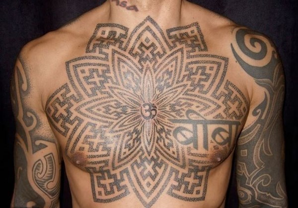 dotwork tattoo on chest and arms