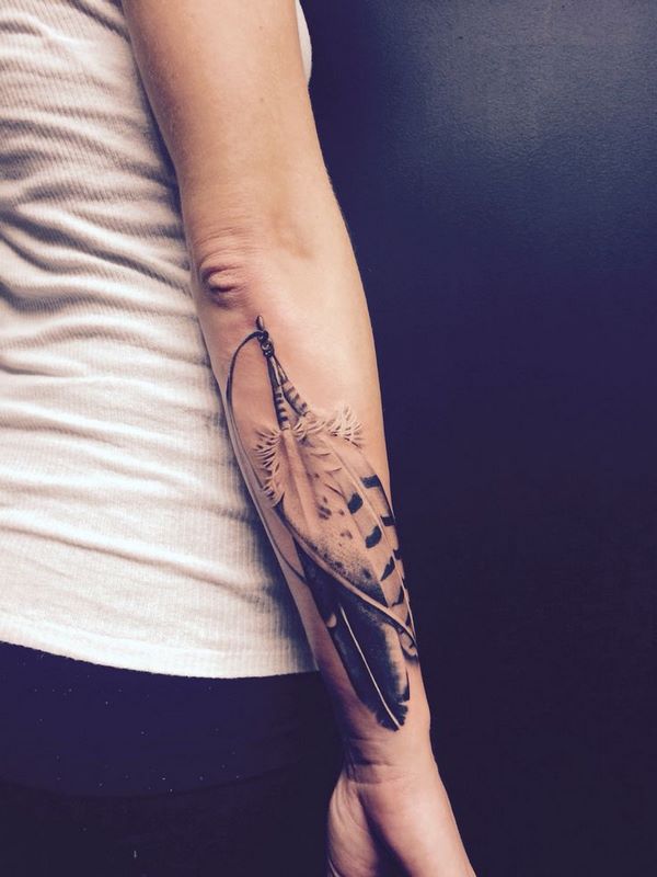 hawk feather tattoo meaning design ideas