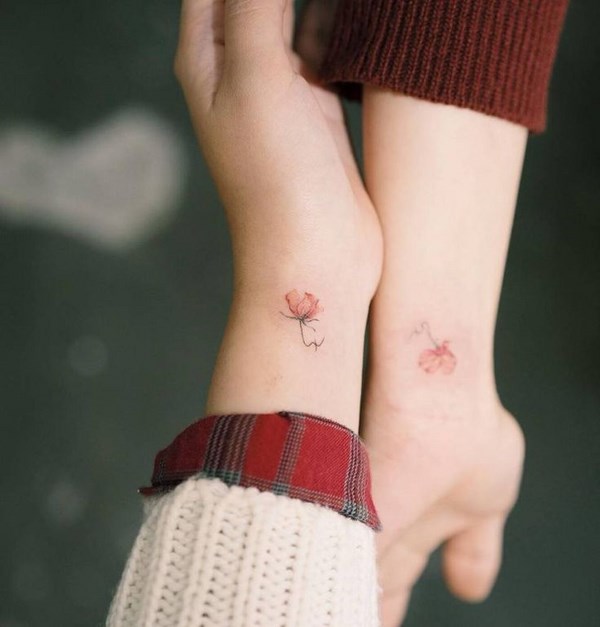 little tattoos on the wrist matching rose tattoos