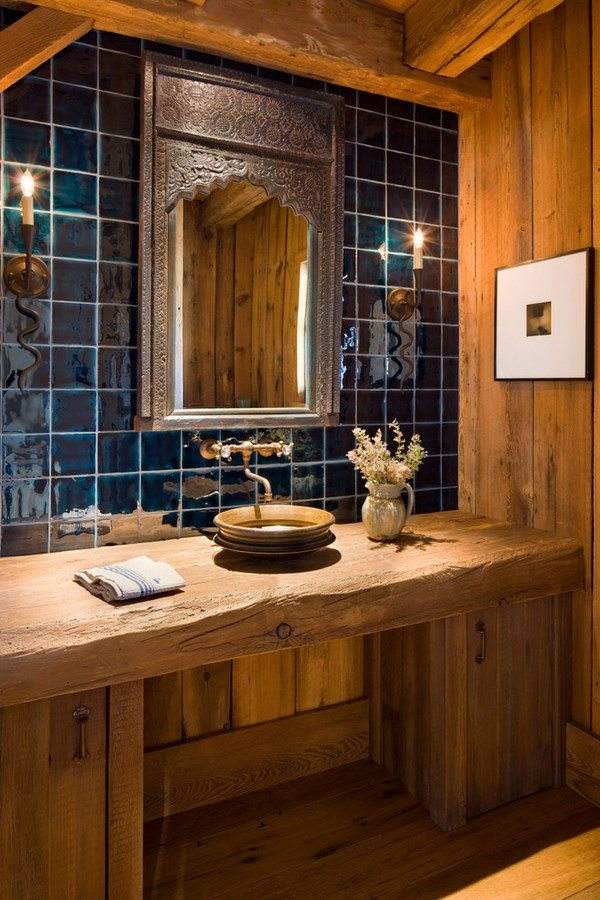 rustic bathroom vanity with vessel sink and blue wall tiles