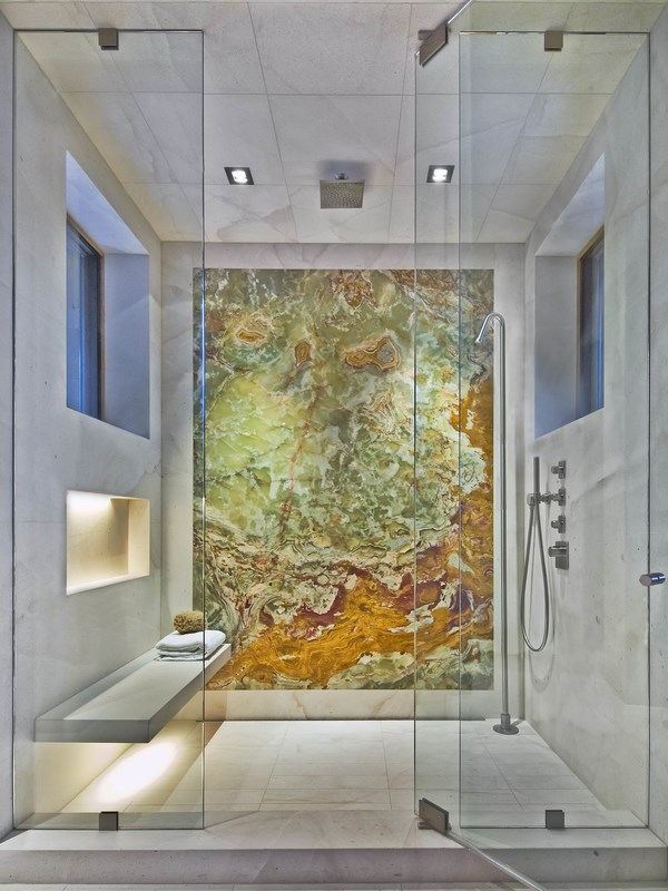 spectacular onyx wall in contemporary bathroom