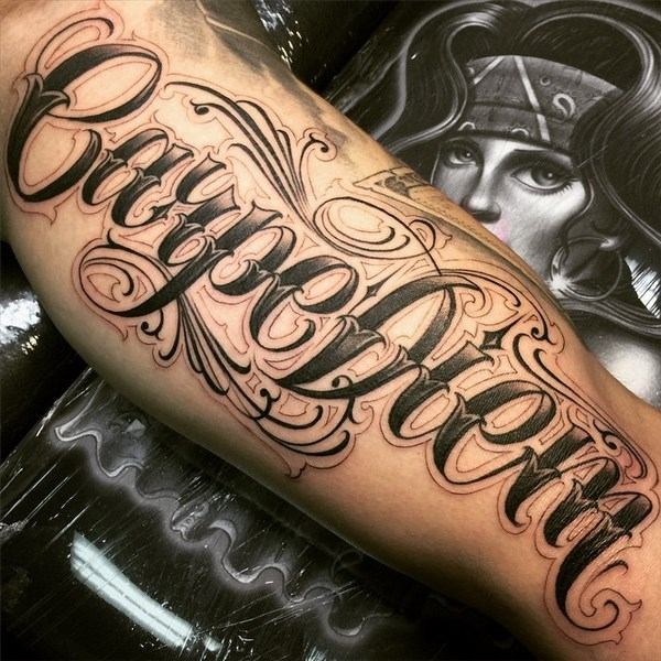 tattoo styles lettering Carpe Diem forearm