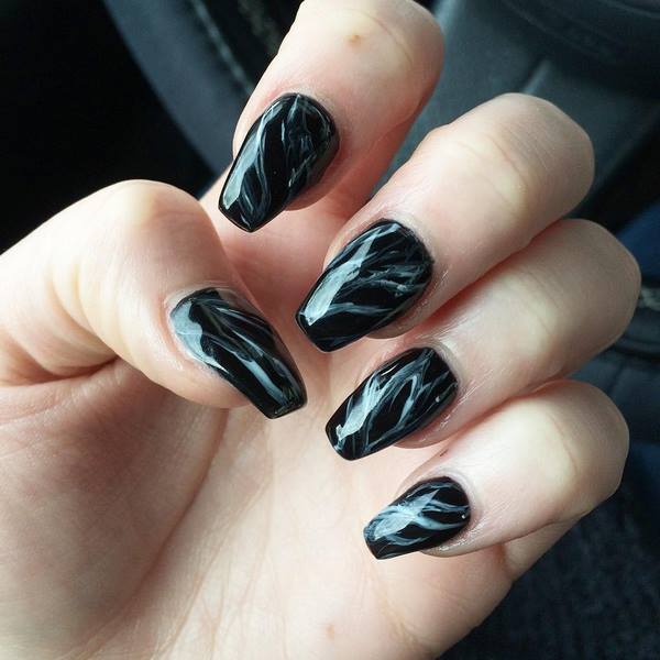 Unique black marble nail design