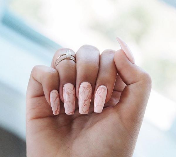 pink nail polish marble effect