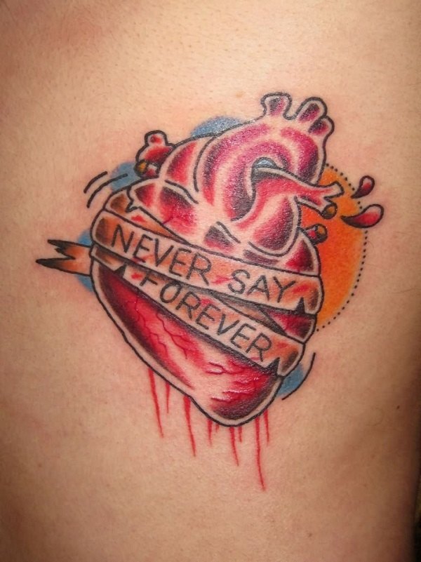 Bleeding heart tattoo with banner