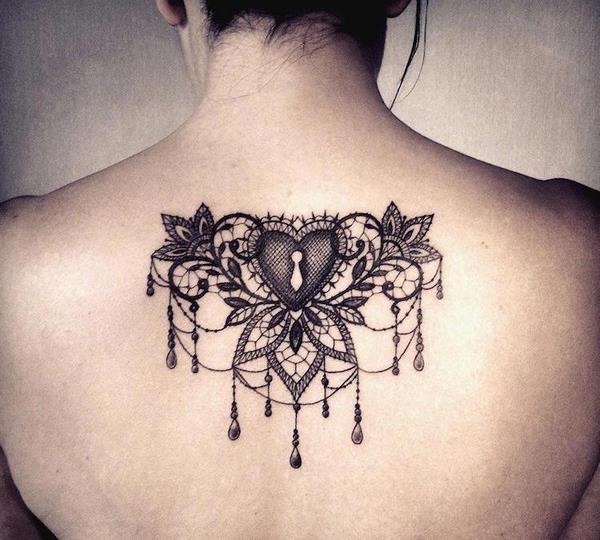 heart tattoo with lace motif for women