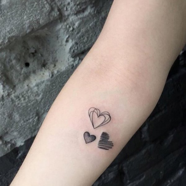intertwined hearts small tatto design ideas