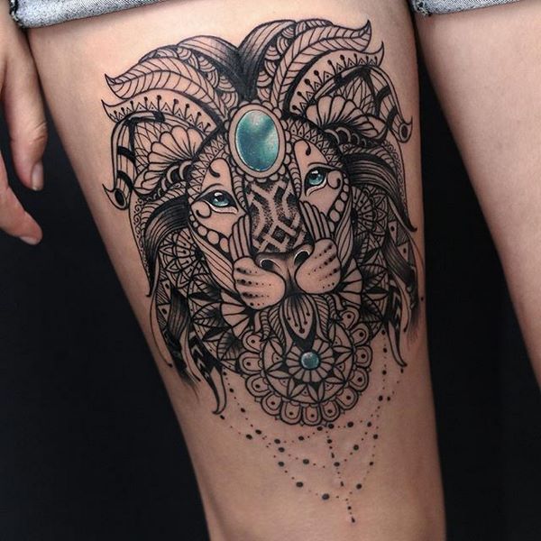 lion mandala thigh tattoo for women