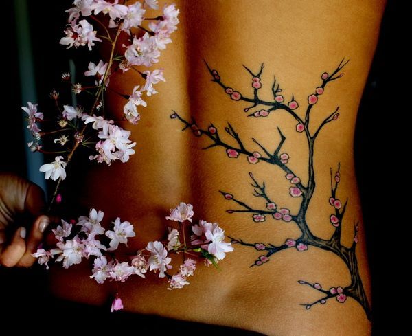 Japanese cherry blossom lower back tattoo