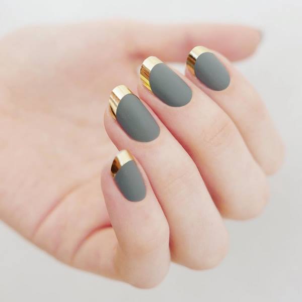 beautiful matte manicure with golden tips