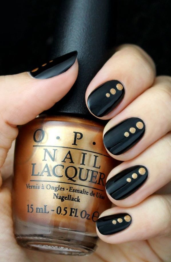 classy simple black nails with golden dots