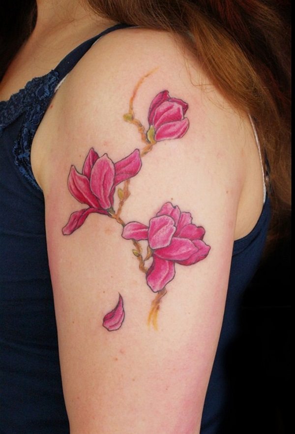 magnolia shoulder tattoo for women