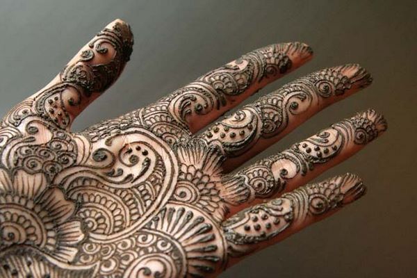 paisley mehendi on hand traditional symbols and meaning