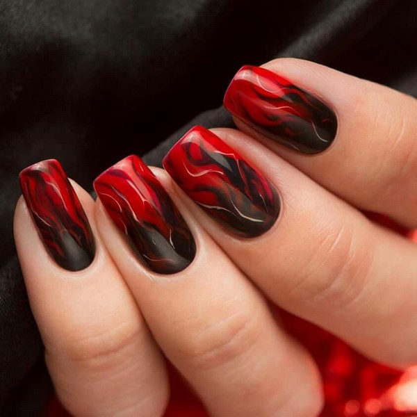 creative black and red manicure marble effect