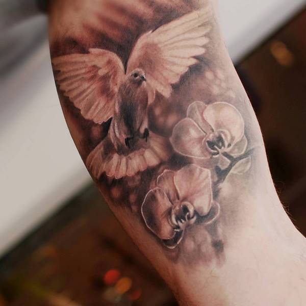 white dove and orchids tattoo spiritual symbols meaning