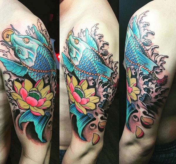 Blue koi fish with water and lotus tattoo