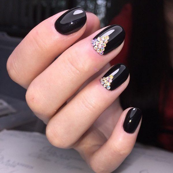 black nail art with rhinestones