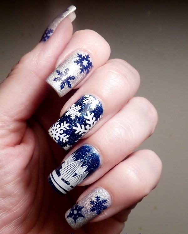 dark blue and silver snowflakes stamp nail art ideas