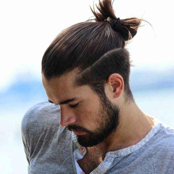 undercut with bun hairstyles for men middle length