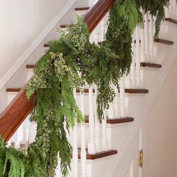 DIY fresh garlands evergreen plants stair railings decor
