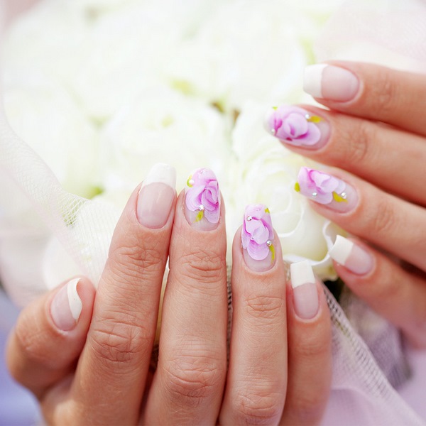wedding nail art with rhiestones and flowers