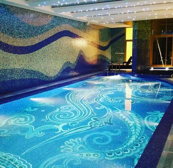 beautiful indoor pool mosaics and lighting