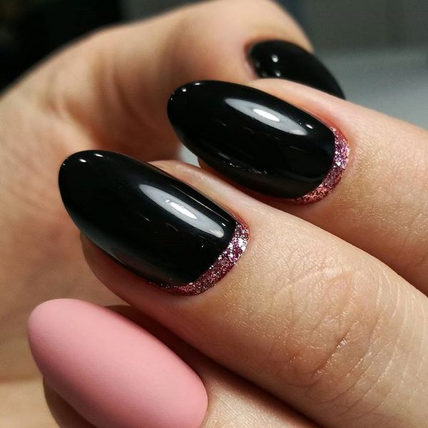 black moon manicure with pink glitter and matte accent