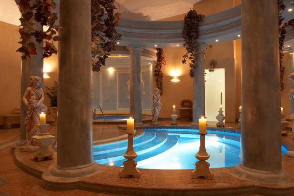 indoor pools design interior decor columns statues