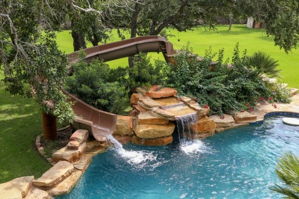 pools with slide waterfall ideas natural stone