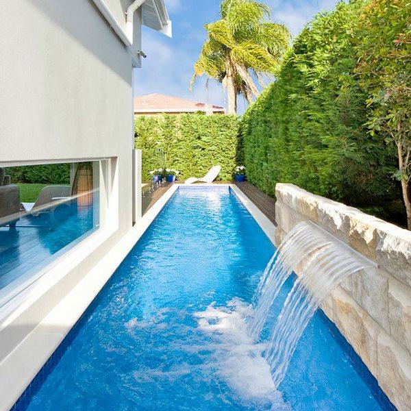 small garden ideas lap pool with water feature waterfall