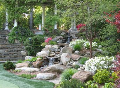 hill-landscaping-ideas-rock-waterfall-stone-stairs