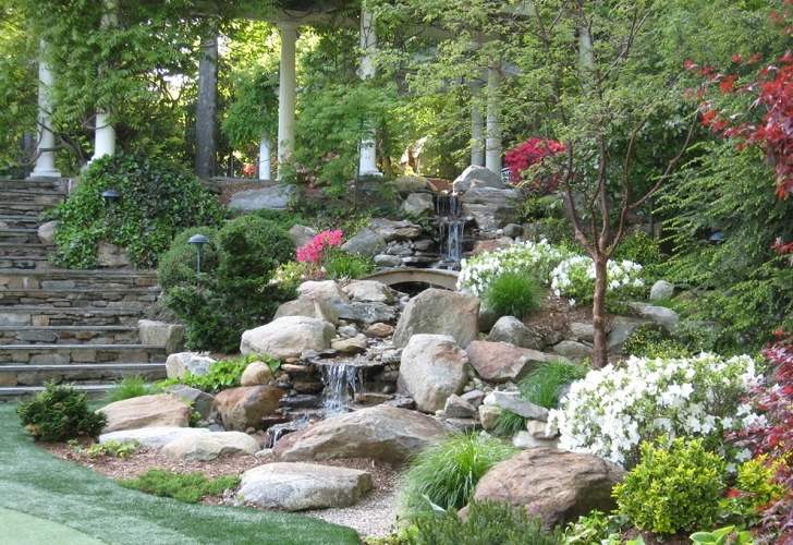 hill-landscaping-ideas-rock-waterfall-stone-stairs