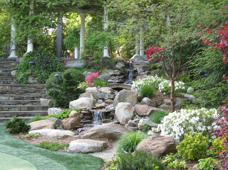 hill landscaping ideas rock waterfall stone stairs